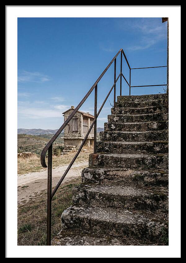 Stone Granary Steps Under Blue Sky