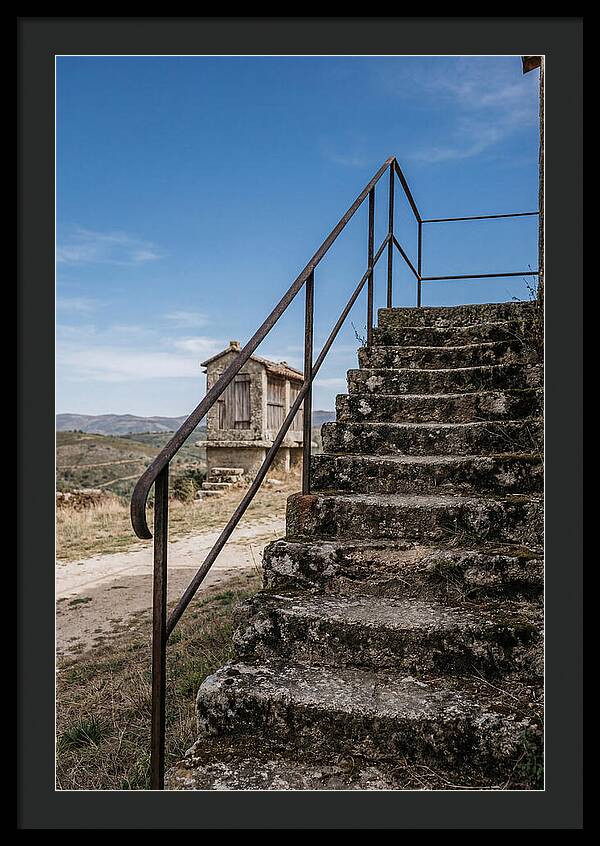 Stone Granary Steps Under Blue Sky