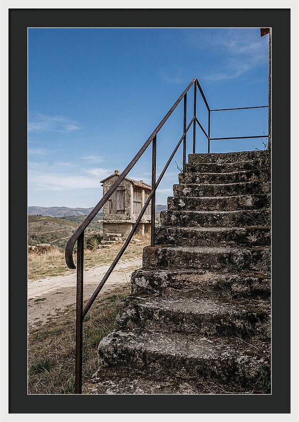 Stone Granary Steps Under Blue Sky
