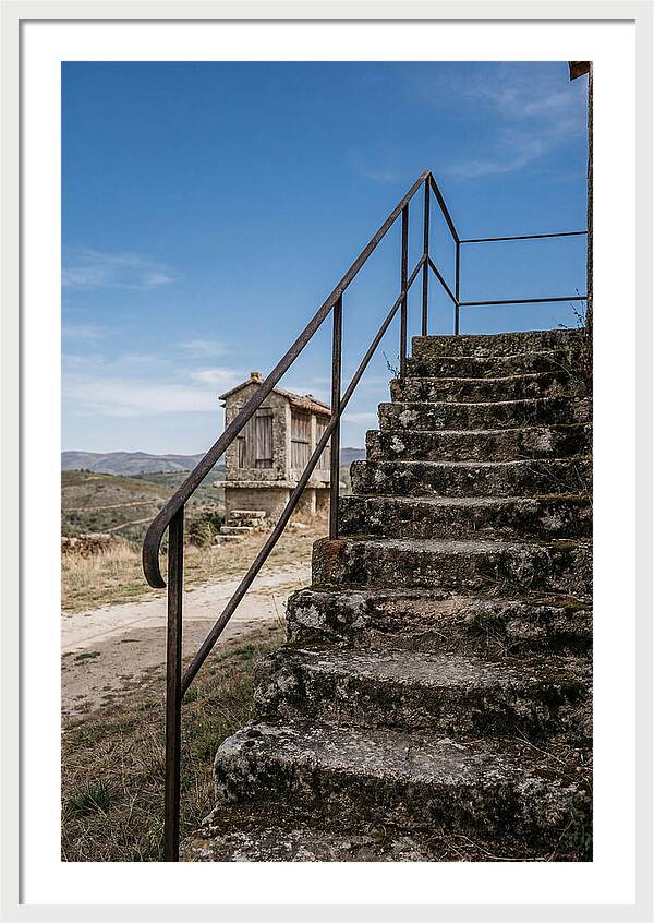 Stone Granary Steps Under Blue Sky