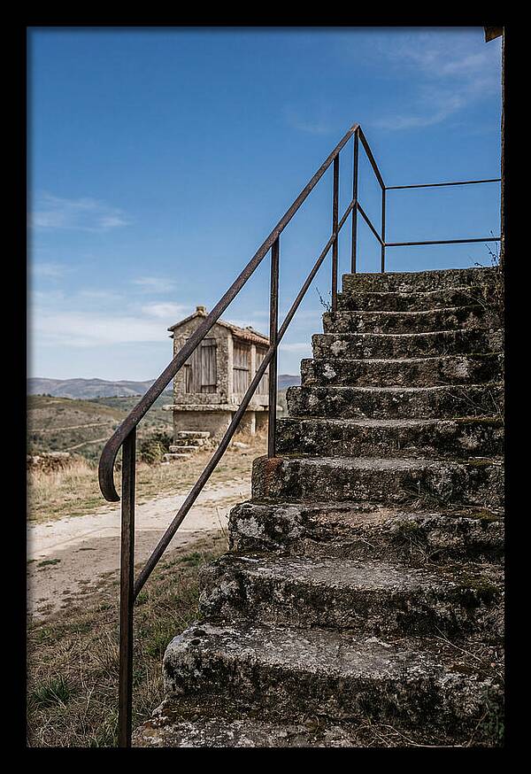 Stone Granary Steps Under Blue Sky