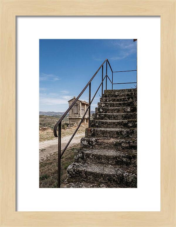 Stone Granary Steps Under Blue Sky