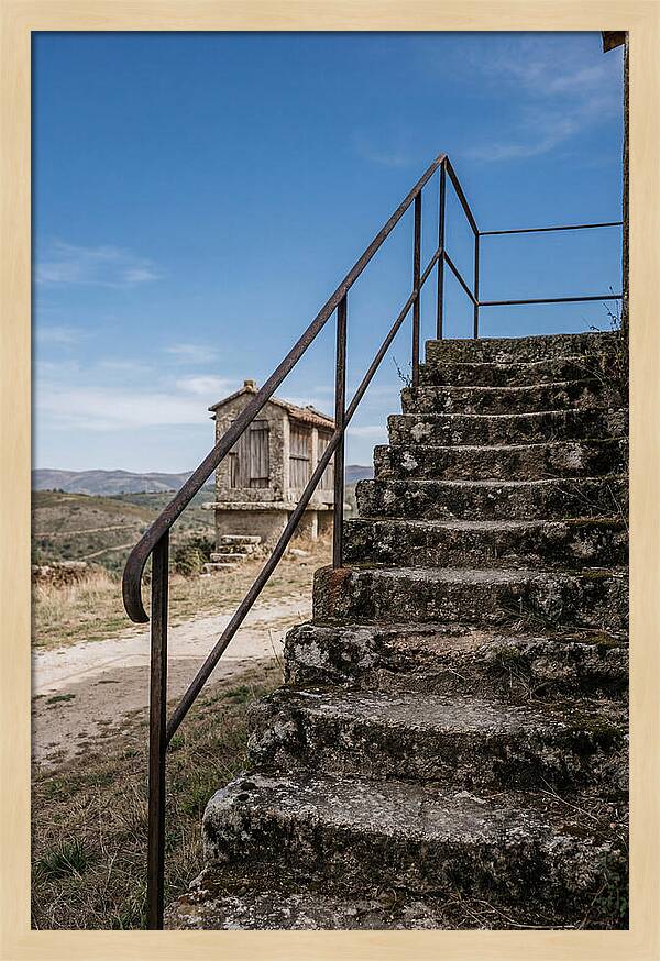 Stone Granary Steps Under Blue Sky