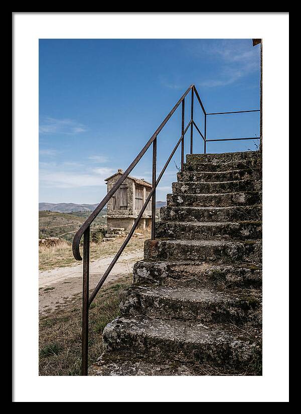 Stone Granary Steps Under Blue Sky
