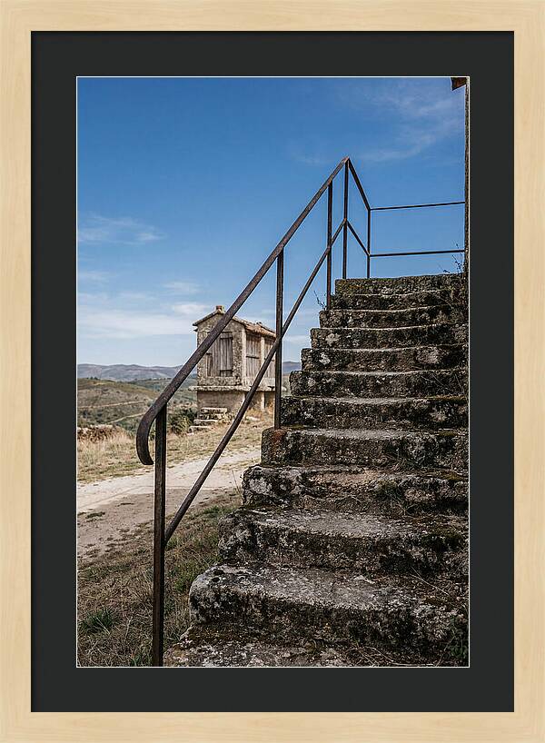 Stone Granary Steps Under Blue Sky