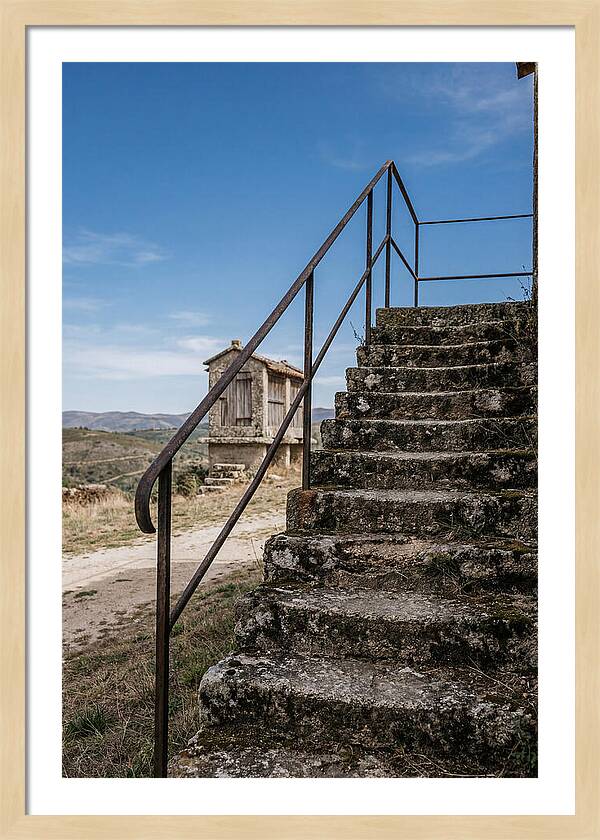 Stone Granary Steps Under Blue Sky