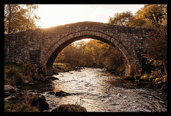 Stone Packhorse Bridge At Sunset