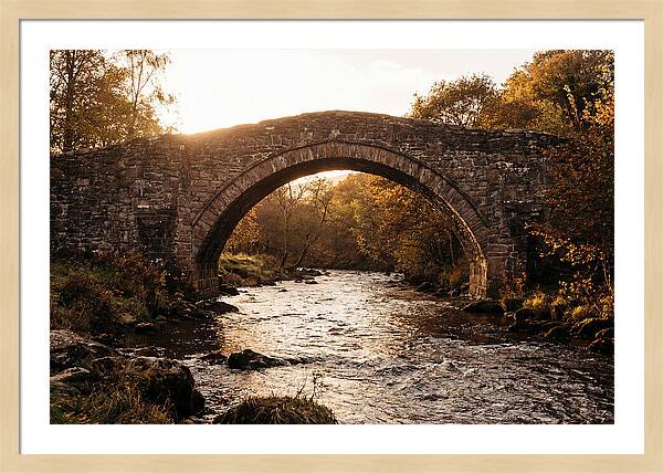 Stone Packhorse Bridge At Sunset