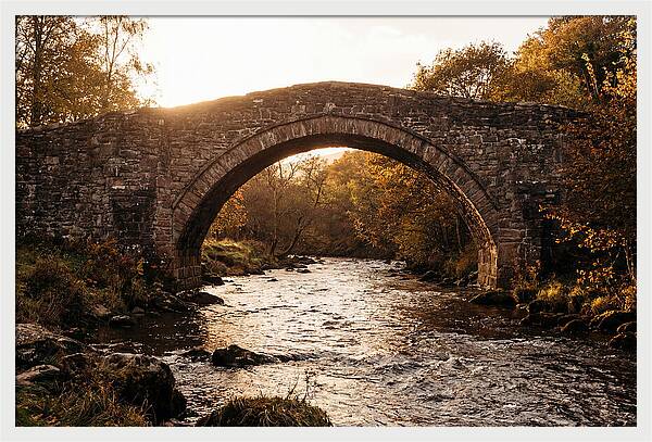Stone Packhorse Bridge At Sunset