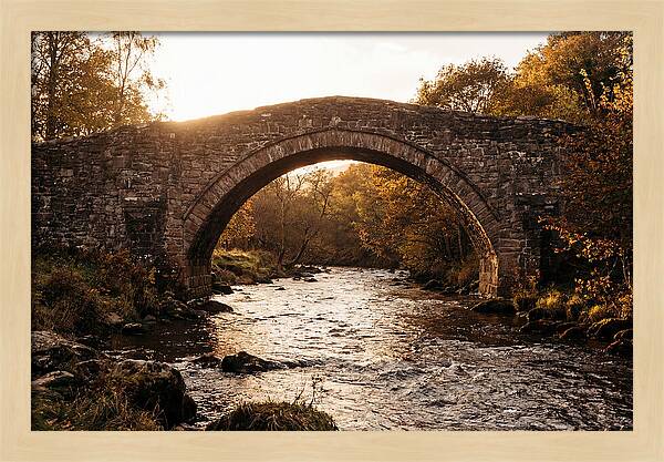 Stone Packhorse Bridge At Sunset
