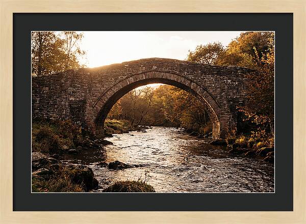 Stone Packhorse Bridge At Sunset