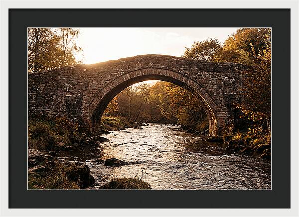 Stone Packhorse Bridge At Sunset