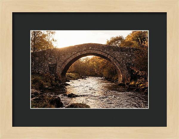 Stone Packhorse Bridge At Sunset