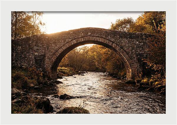 Stone Packhorse Bridge At Sunset