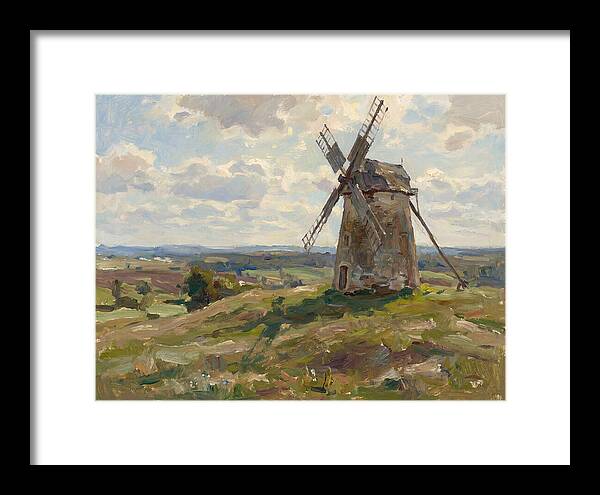 Stone Windmill Under Cloudy Skies