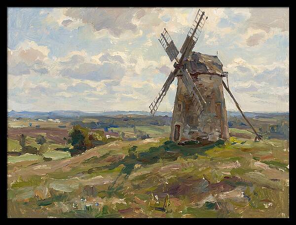 Stone Windmill Under Cloudy Skies