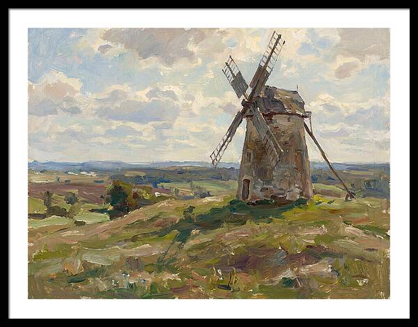 Stone Windmill Under Cloudy Skies