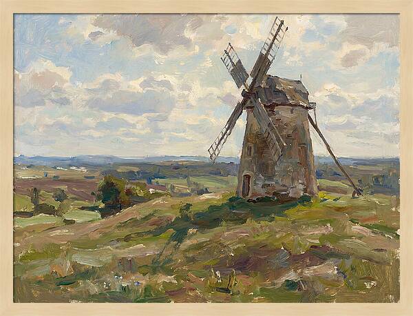 Stone Windmill Under Cloudy Skies