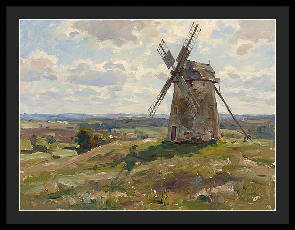 Stone Windmill Under Cloudy Skies