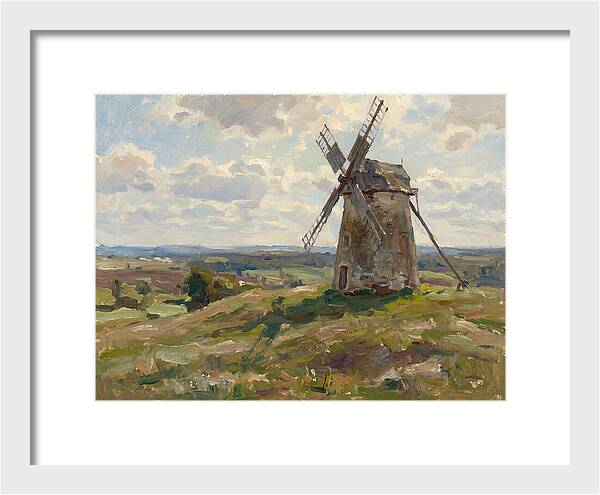 Stone Windmill Under Cloudy Skies