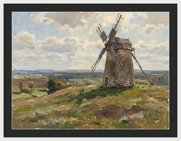Stone Windmill Under Cloudy Skies