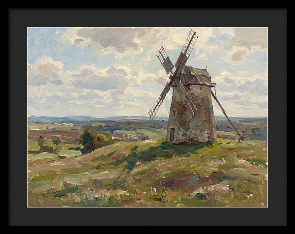 Stone Windmill Under Cloudy Skies