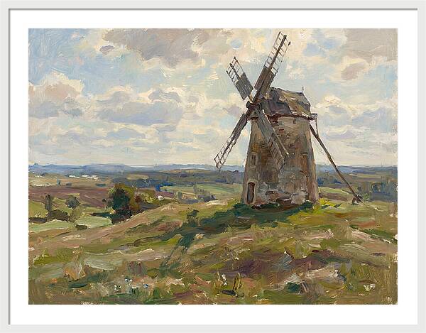 Stone Windmill Under Cloudy Skies