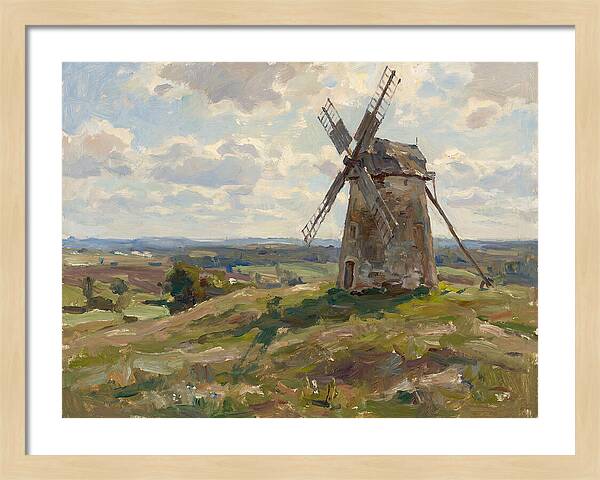Stone Windmill Under Cloudy Skies