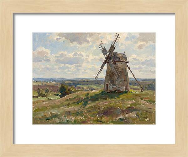 Stone Windmill Under Cloudy Skies