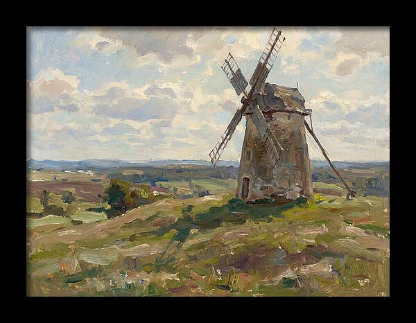 Stone Windmill Under Cloudy Skies