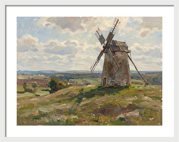 Stone Windmill Under Cloudy Skies