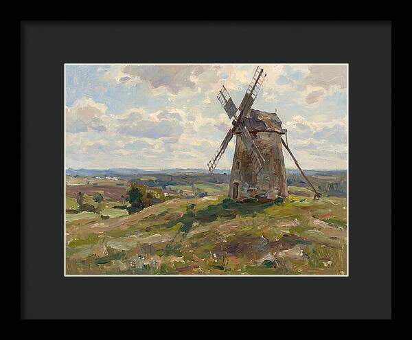 Stone Windmill Under Cloudy Skies