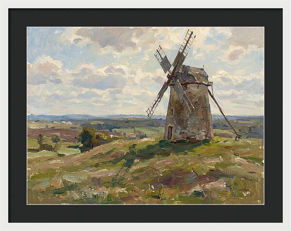 Stone Windmill Under Cloudy Skies