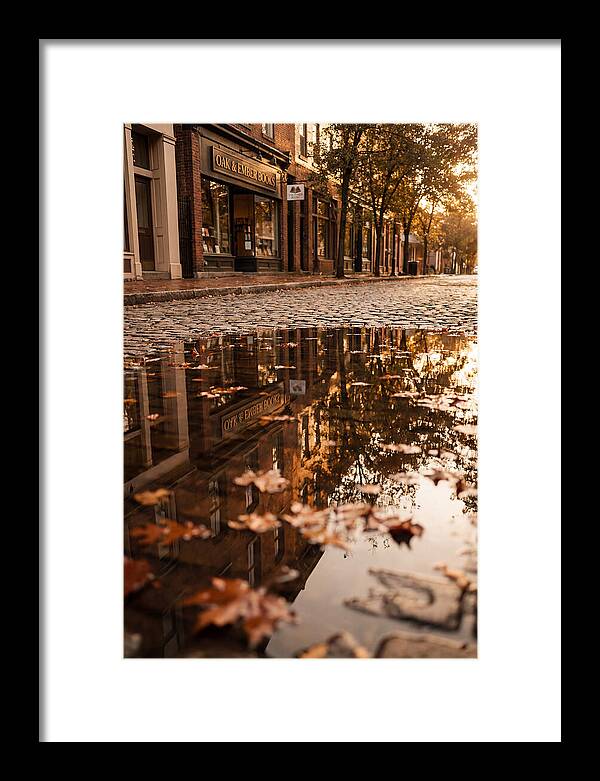 Storefront Reflection In Autumn Puddle