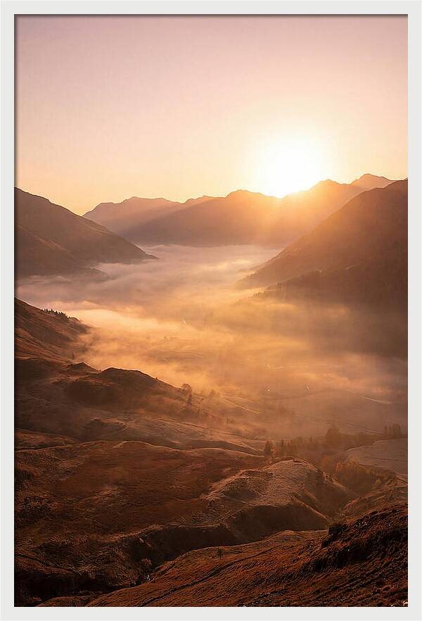 Sunrise Over Misty Mountain Valley