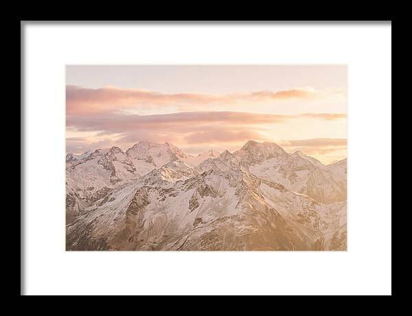 Sunrise Over Snowy Peaks