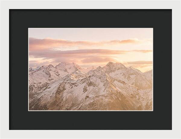 Sunrise Over Snowy Peaks