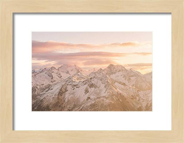 Sunrise Over Snowy Peaks