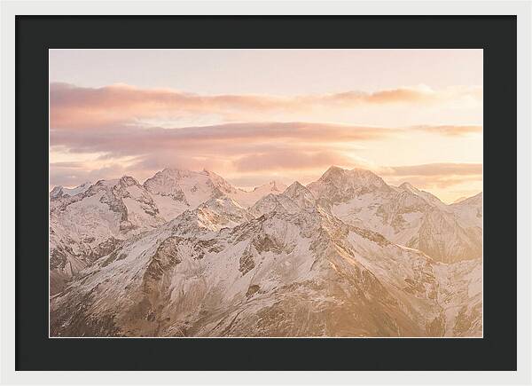 Sunrise Over Snowy Peaks