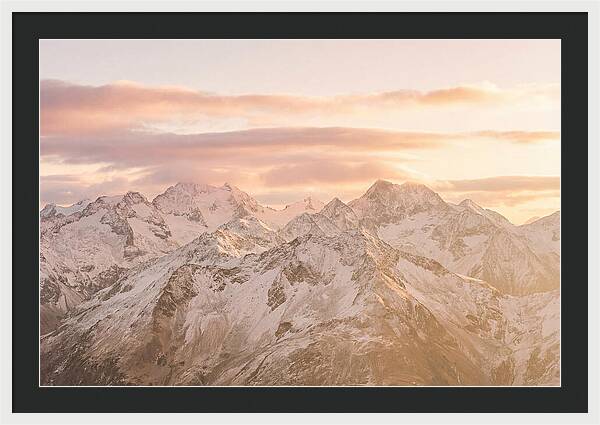 Sunrise Over Snowy Peaks