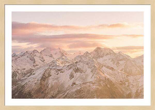 Sunrise Over Snowy Peaks