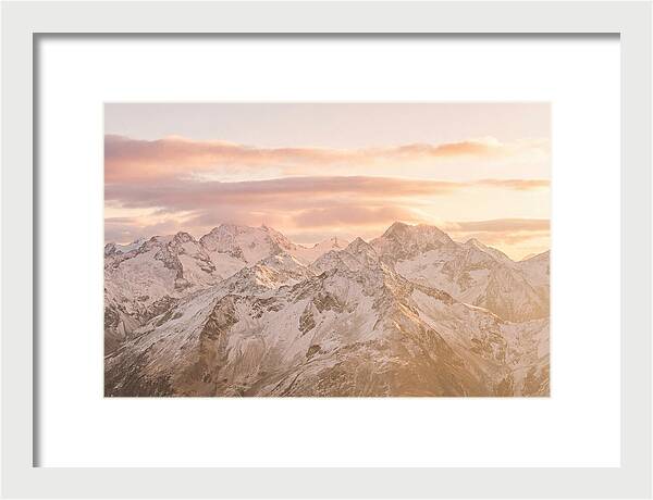 Sunrise Over Snowy Peaks