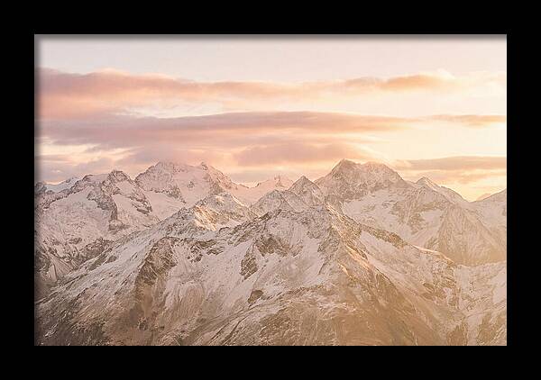 Sunrise Over Snowy Peaks