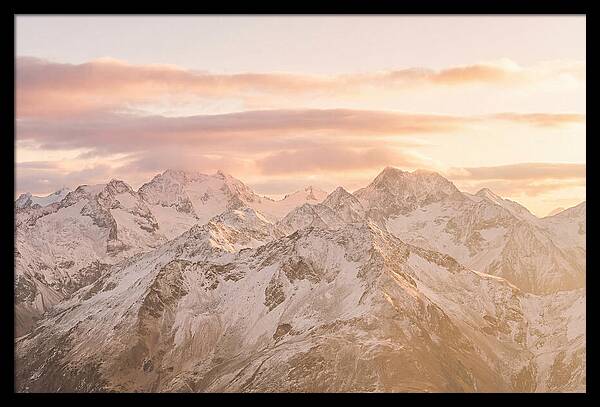 Sunrise Over Snowy Peaks