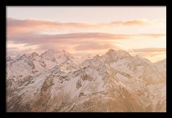 Sunrise Over Snowy Peaks