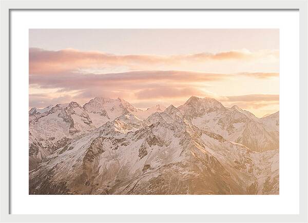 Sunrise Over Snowy Peaks