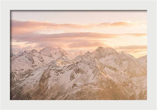 Sunrise Over Snowy Peaks