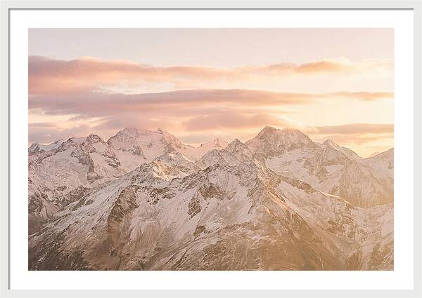 Sunrise Over Snowy Peaks