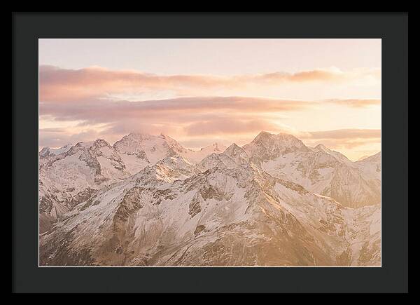 Sunrise Over Snowy Peaks