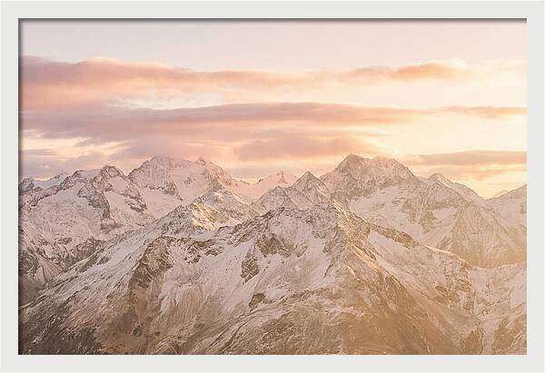 Sunrise Over Snowy Peaks